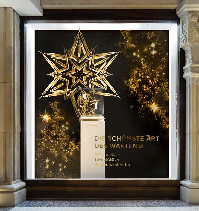 Detailaufnahme des goldenen Stern-Motivs mit Babor-Ampullen, entworfen von MORE PIOUS STUDIOS